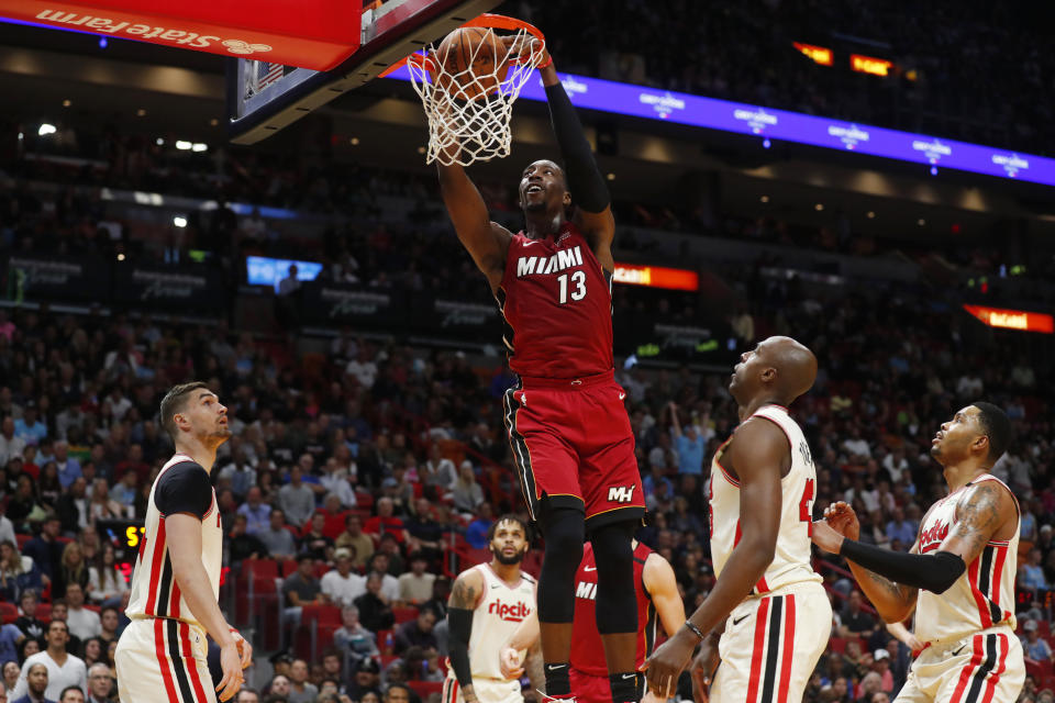 Miami Heat center Bam Adebayo (13) dunks the ball during the second half of an NBA basketball game against the Portland Trail Blazers, Sunday, Jan. 5, 2020, in Miami. Adebayo had 20 points on 9-for-10 shooting as the Heat defeated the Trail Blazers 122-111. (AP Photo/Wilfredo Lee)