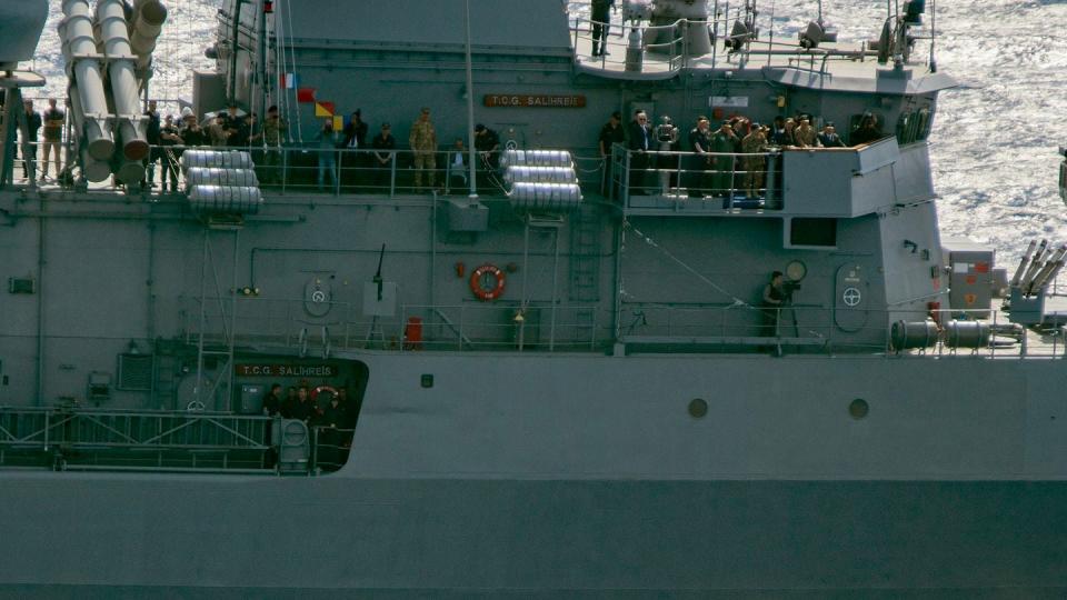 An Albatos-S unmanned surface vessel passes the TCG Salihreis of the Turkish Naval Forces. Onlookers aboard the frigate included the defense minister; the chief of the General Staff; the commanders of the Naval Forces, the Land Forces and the Air Forces; and other high-ranking officers. (Cem Devrim Yaylali/Staff)