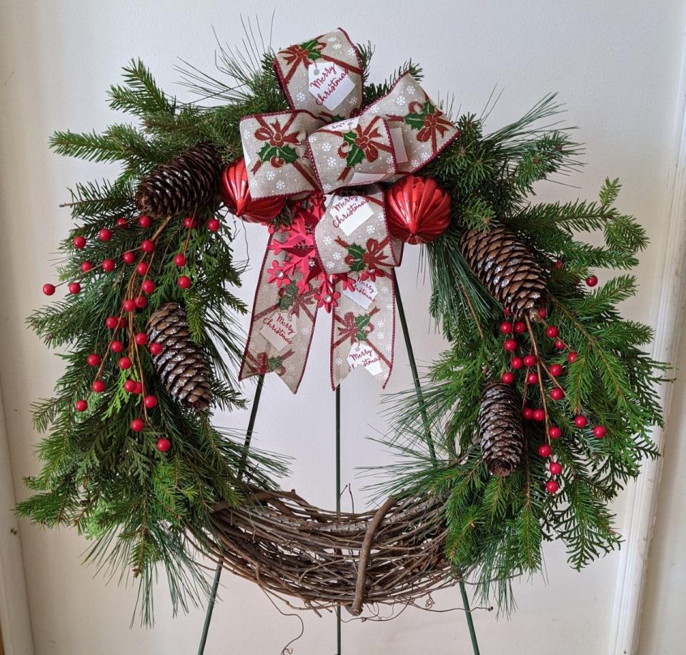 Purchase a one-of-a-kind holiday evergreen creation (similar to the one pictured, plus other designs) to benefit the Iowa Arboretum & Gardens.