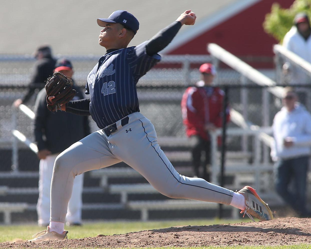 Plymouth North's DC Brown pitches to a Hingham batter in the bottom of the first inning of their game against Hingham at Hingham High on Wednesday, May 17, 2023. 