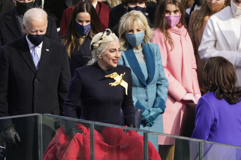 Lady Gaga arrives to sing the National Anthem during the 59th Presidential Inauguration at the U.S. Capitol in Washington, Wednesday, Jan. 20, 2021. (AP Photo/Andrew Harnik)