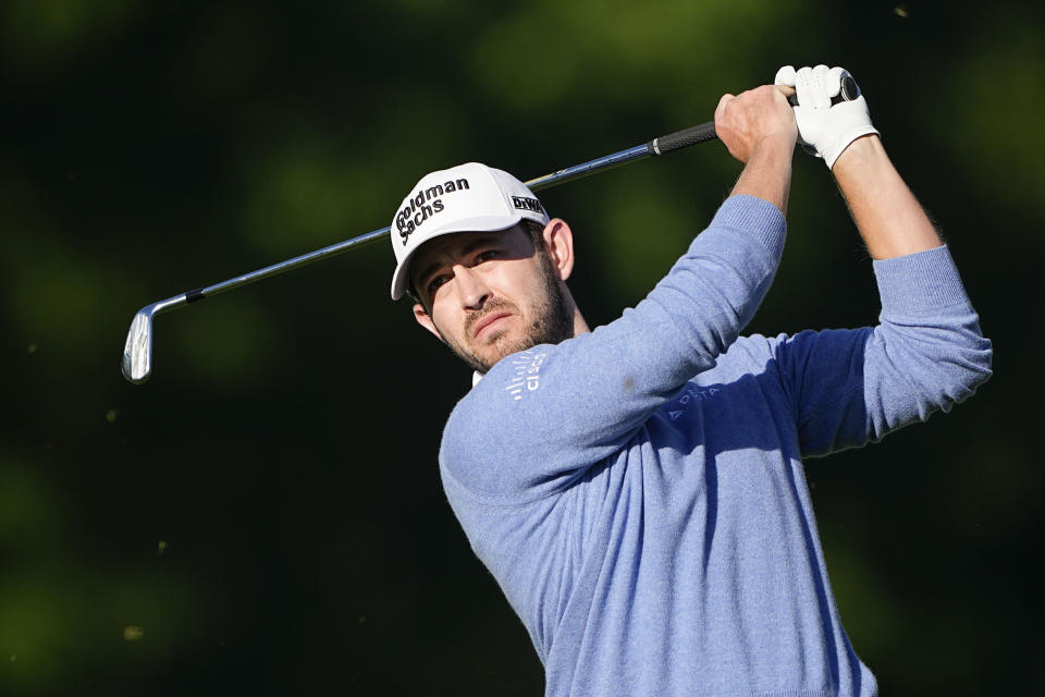 Patrick Cantlay watches his tee shot on the 13th hole during first round of the Wells Fargo Championship golf tournament at the Quail Hollow Club on Thursday, May 4, 2023, in Charlotte, N.C. (AP Photo/Chris Carlson)