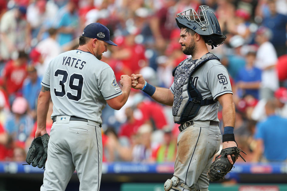 PHILADELPHIA, PA - AUGUST 18: Pitcher Kirby Yates #39 fist bumps catcher Austin Hedges #18 after defeating the Philadelphia Phillies 3-2 in a game at Citizens Bank Park on August 18, 2019 in Philadelphia, Pennsylvania. (Photo by Rich Schultz/Getty Images)