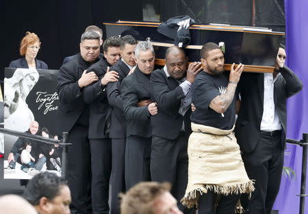 Former All Black Jonah Lomu's casket is carried out of Eden Park during his memorial service in Auckland, New Zealand, November 30, 2015. REUTERS/Nigel Marple