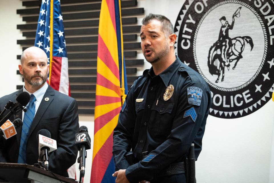 Sgt. Kevin Quon (right) answers a question during a news conference on Jan. 12, 2023, at the Scottsdale Police Headquarters in Scottsdale.