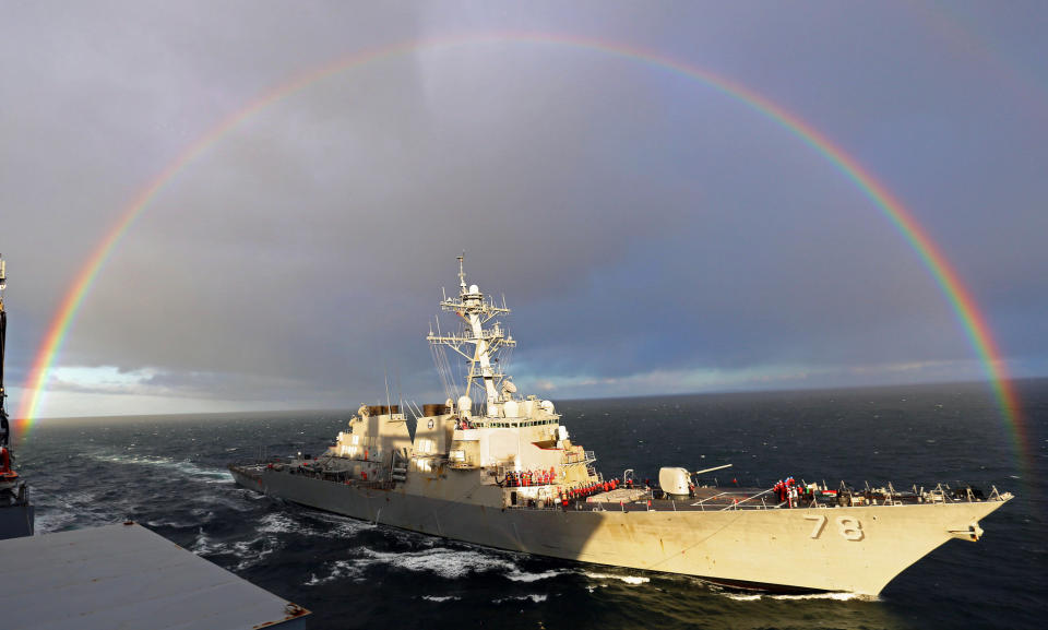The guided-missile destroyer USS Porter (DDG 78) pulls alongside the Military Sealift Command dry cargo and ammunition ship USNS Medgar Evers (T-AKE 13) before a replenishment-at-sea on April 15, 2015. 