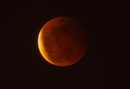 <p>DONGGUAN, CHINA - MAY 26: The super moon is seen during the total lunar eclipse on May 26, 2021 in Dongguan, Guangdong Province of China. (Photo by Gong Mingyang/VCG via Getty Images)</p> 