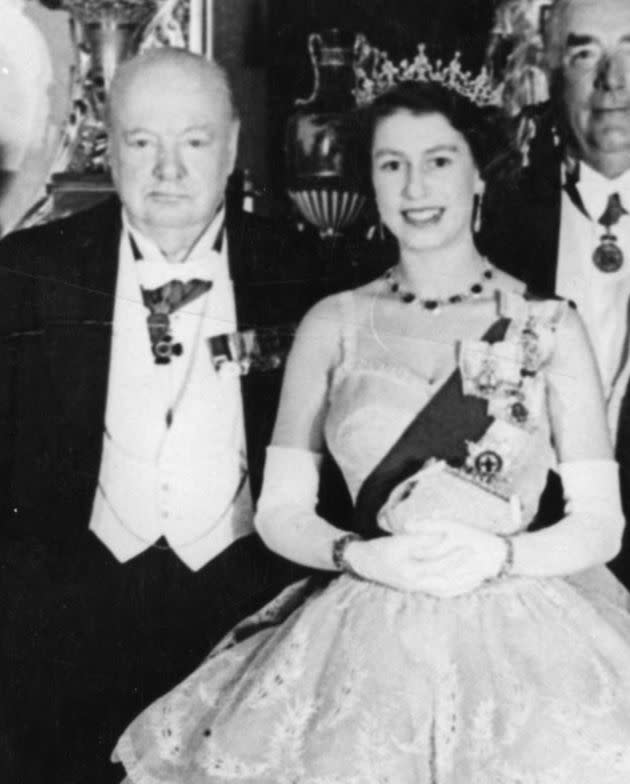 Winston Churchill and the Queen, pictured in December 1952, during the first year of her reign (Photo: PA via PA Wire/PA Images)