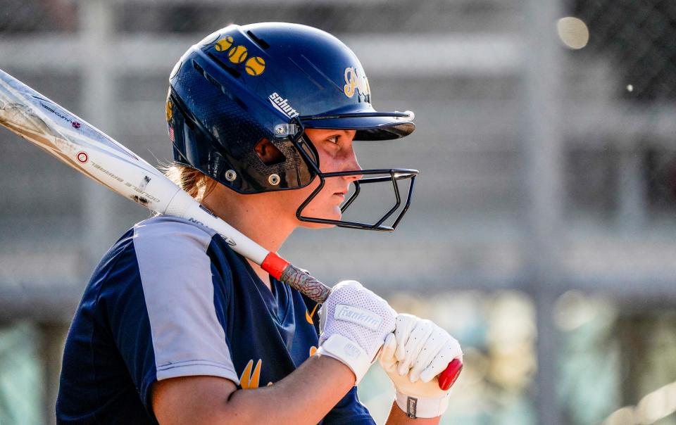 Mooresville's Maddie Gainey (24) warms up to bat during a game between the Mooresville Pioneers and the Whiteland Lady Warriors on Tuesday, May 17, 2022, at Whiteland High School in Whiteland Ind. 
