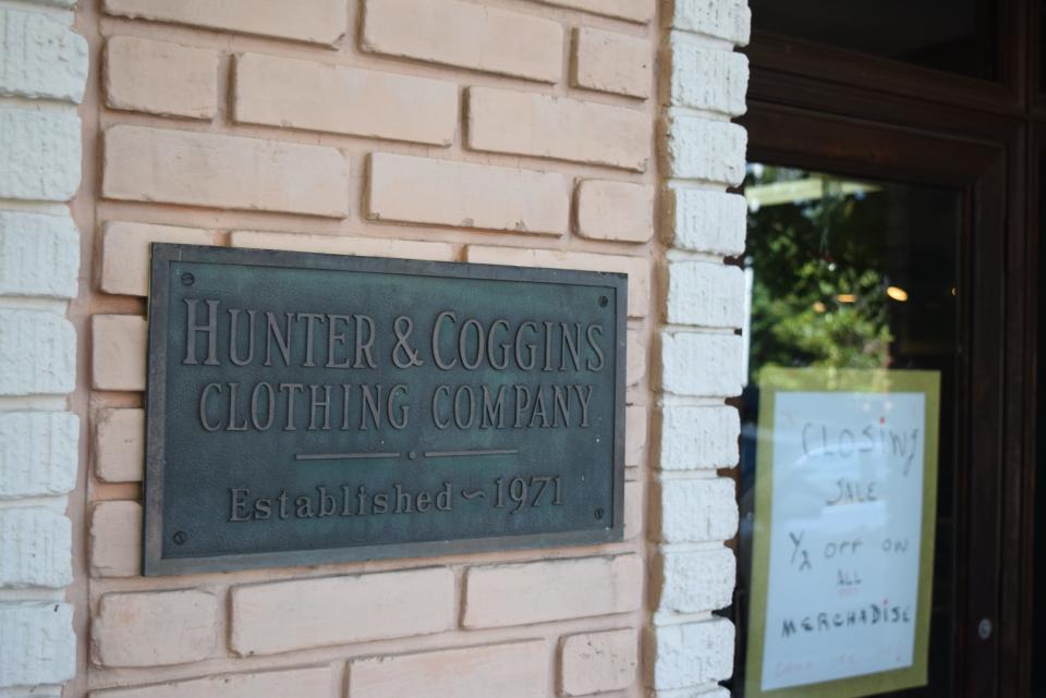 Hunter and Coggins plaque outside of the store, which was opened in 1971. Sept. 19, 2023.