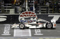 FILE - In this June 10, 2017, file photo, Will Power, of Australia, pumps his fist as he crosses the finish line under yellow to win an IndyCar auto race at Texas Motor Speedway, in Fort Worth, Texas. IndyCar is getting ready for an all-in-one-day season opener on the fast track in Texas, more than 2 ½ months after drivers were set to roll on the streets of St. Pete. The pandemic-delayed season is now set to open Saturday, June 6, 2020. (AP Photo/Tony Gutierrez, File)
