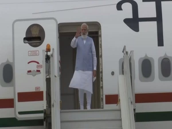 Prime Minister Narendra Modi arrives in New Delhi on Sunday. (Photo/ANI)