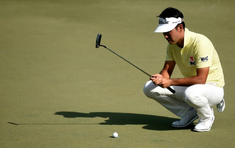 Kevin Na lines up a putt on the 15th green during the third round of the Wyndham Championship, at Sedgefield Country Club in Greensboro, North Carolina, on August 19, 2017