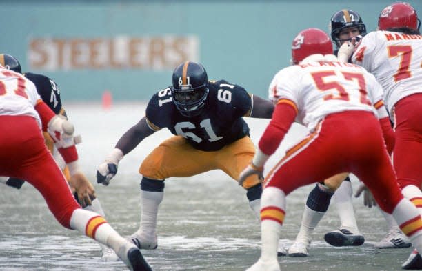 Offensive lineman Tyrone McGriff (61) of the Pittsburgh Steelers blocks during a game against the Kansas City Chiefs at Three Rivers Stadium on Dec.14, 1980. McGriff played college football at Florida A&M University.