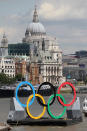 A barge displaying a giant set of Olympic rings is positioned in the centre of the River Thames on July 30, 2012 in London, England. London's transport infrastructure is expected to face a major burden today on the first working day of the London 2012 Olympic Games. (Photo by Oli Scarff/Getty Images)