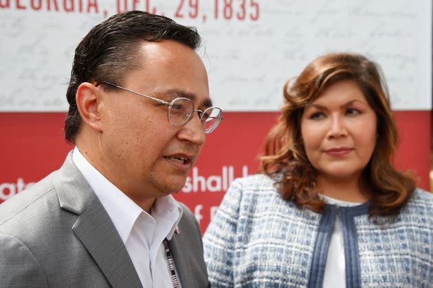 Cherokee Nation Principal Chief Chuck Hoskin Jr., left, at the 2019 announcement that he intended to send former Obama White House staffer Kim Teehee, right, to Washington as the Cherokees' delegate in the House of Representatives. (Photo: via Associated Press)