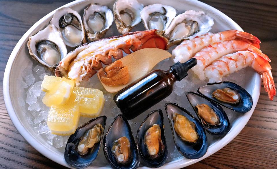 Build your own seafood platter from 1033's raw bar, which includes 1/2 lobster tails, shrimp, oysters, caviar bumps and more.