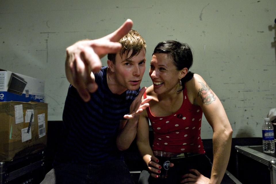 Matt and Kim pose after a show in 2009. (Photo: Getty Images)