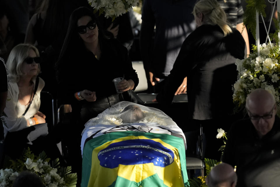 Brazilian soccer great Pele lies in state at Vila Belmiro stadium in Santos, Brazil, Monday, Jan. 2, 2023. (AP Photo/Andre Penner)