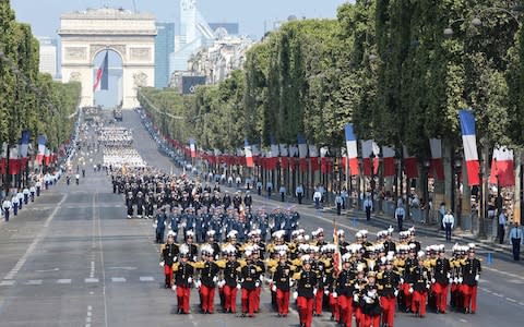 Military regiments in the annual Bastille Day military parade on the Champs-Elysees avenue near the Arc de Triomphe in Paris on July 14, 2018 - Credit: Ludovic Marin/AFP