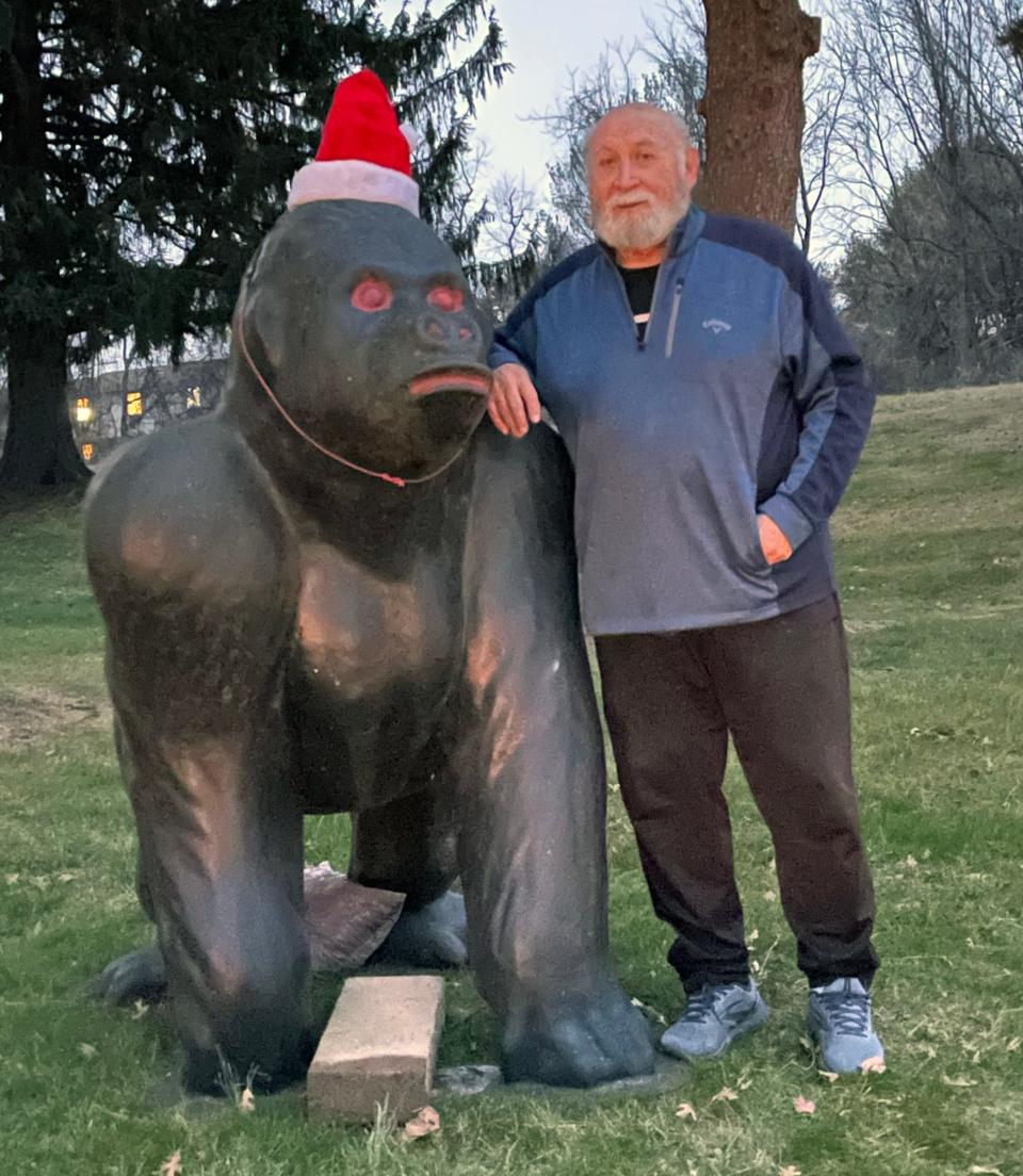 Tom Sinibaldi with the gorilla he received for Christmas before he painted the eyes and teeth.