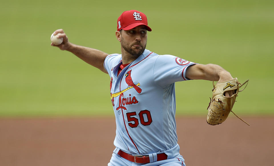 St. Louis Cardinals pitcher Adam Wainwright works against the Atlanta Braves in the first inning of the first baseball game of a double header Saturday, June 19, 2021, in Atlanta. (AP Photo/Ben Margot)