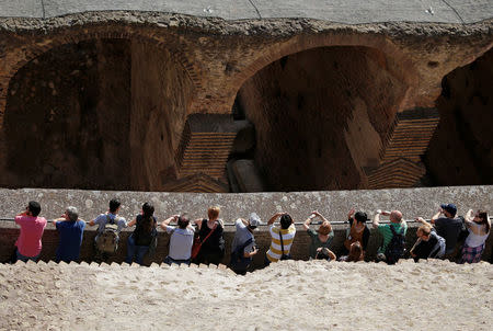 Tourists visit the Colosseum in Rome, Italy, October 17, 2017. Picture taken October 17, 2017. REUTERS/Max Rossi