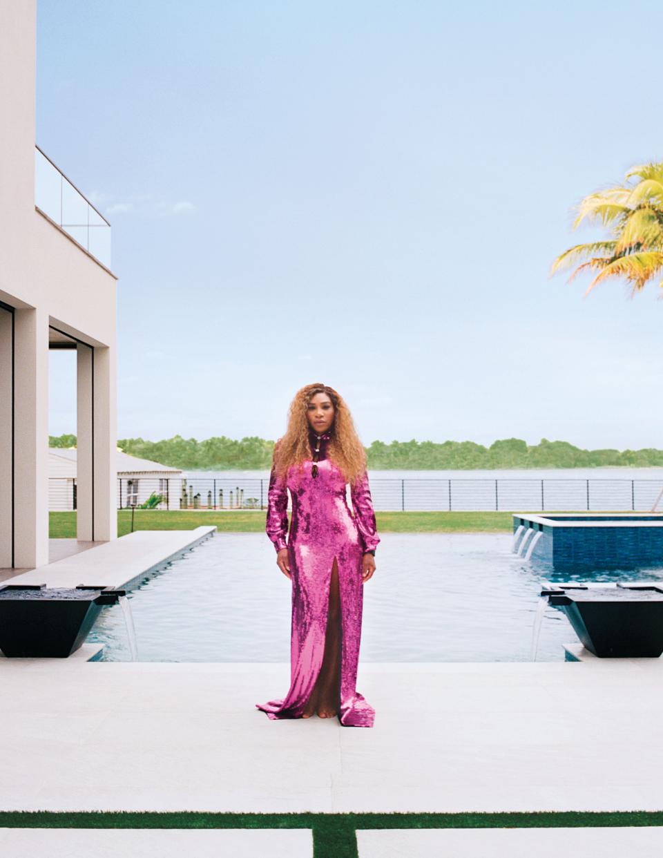 Williams, poolside in Gucci and Serena Williams jewelry. The terrace is clad in White Falda porcelain tile. Landscape design by Lucido & Assoc. Fashion styling by Kesha Mcleod.