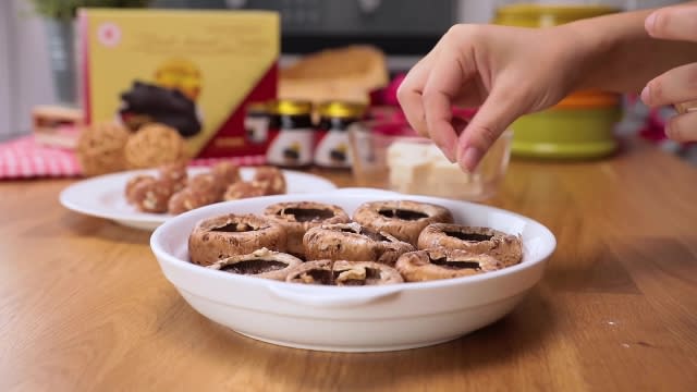 Seasoning portobello mushrooms with salt