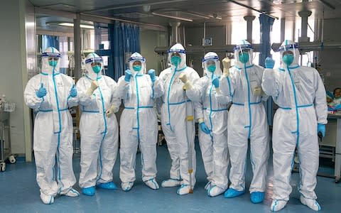 Medical workers in Wuhan's Zhongnan hospital - Credit: &nbsp;Xinhua / Alamy Live News