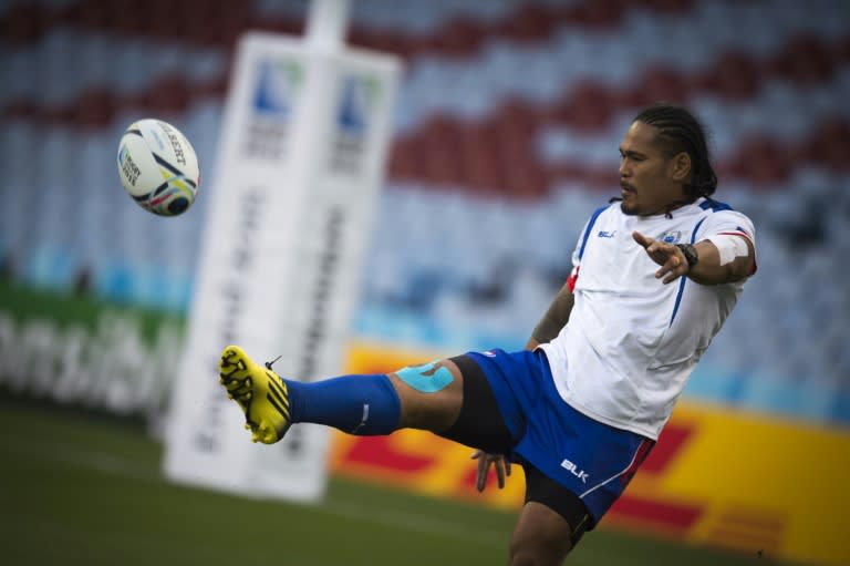 Samoa's wing Alesana Tuilagi kicks the ball during the captain's run training session at Villa park stadium in Birmingham on September 25, 2015