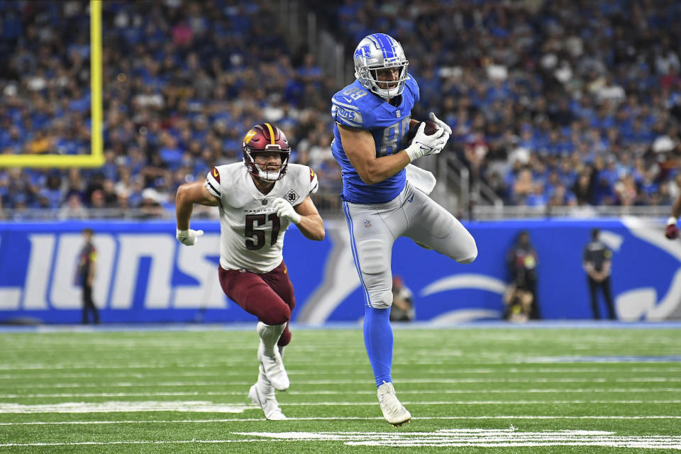 Detroit Lions tight end Brock Wright (89) makes a catch against Washington Commanders linebacker David Mayo (51) during the second half of an NFL football game Sunday, Sept. 18, 2022, in Detroit. (AP Photo/Lon Horwedel)