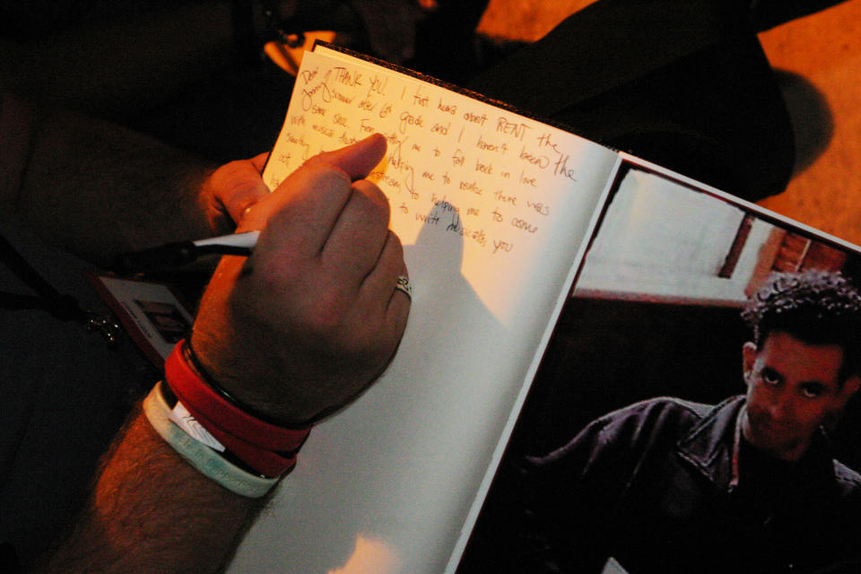 NEW YORK, NY - September 5:  MANDATORY CREDIT Bill Tompkins/Getty Images  RENTheads, the  fans of the Broadway musical RENT celebrate the final weekend performances before the show's closing at Life Cafe in New York's East Village, where RENT was inspired and created by late creator Jonathan Larson. Fans sign a guest book. September 5, 2008 in New York City. (Photo by Bill Tompkins/Getty Images)