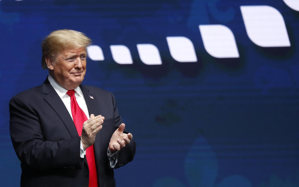 President Donald Trump arrives on stage to speak at the American Farm Bureau Federation convention in New Orleans, Monday, Jan. 14, 2019. (AP Photo/Gerald Herbert)