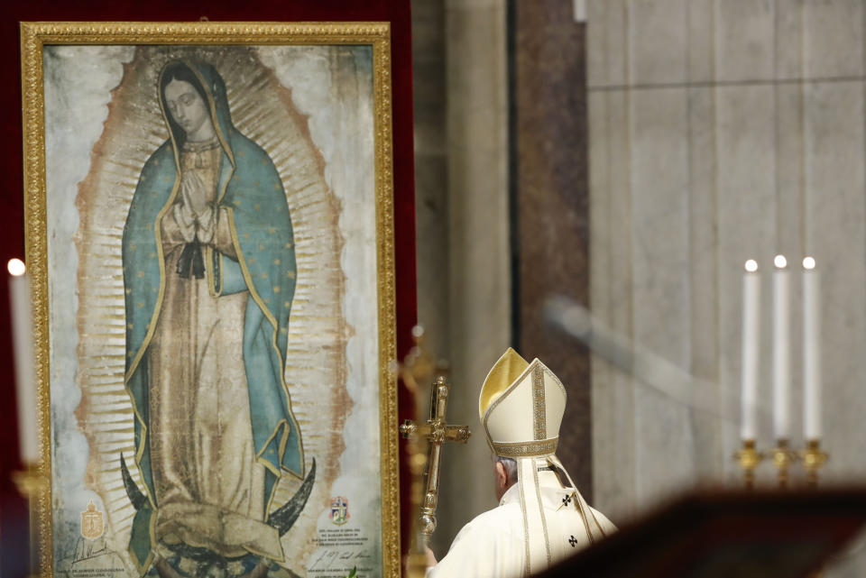 Pope Francis celebrates Mass on the occasion of the feast of Our Lady of Guadalupe, in St. Peter's Basilica at the Vatican, Saturday, Dec. 12, 2020. (Remo Casilli/Pool via AP)