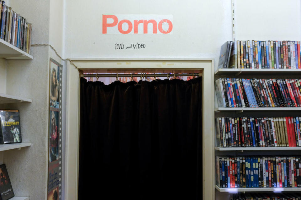 A porno room separated by a black curtain