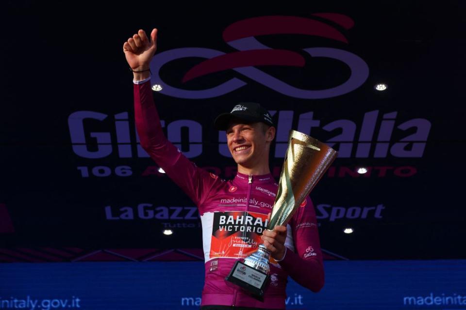 Bahrain  Victoriouss Italian rider Jonathan Milan celebrates wining the best sprinters cyclamen jersey on the podium after the Giro dItalia 2023 cycling race in Rome on May 28 2023 Photo by Luca Bettini  AFP Photo by LUCA BETTINIAFP via Getty Images