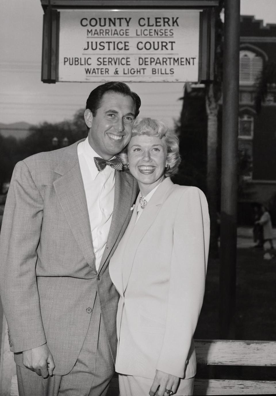 <p>Doris Day and Marty Melcher opted for matching ensembles on their wedding day. Wearing a cream-colored menswear-inspired suit, the <em>Pillow Talk </em>actress made it official with the film producer at Burbank City Hall.</p>