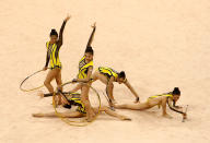 BEIJING - AUGUST 22: Team Japan competes in the Group All-Around Qualification round of the Rhythmic Gymnastics event at the Beijing University of Technology Gymnasium on Day 14 of the Beijing 2008 Olympic Games on August 22, 2008 in Beijing, China. (Photo by Vladimir Rys/Bongarts/Getty Images)