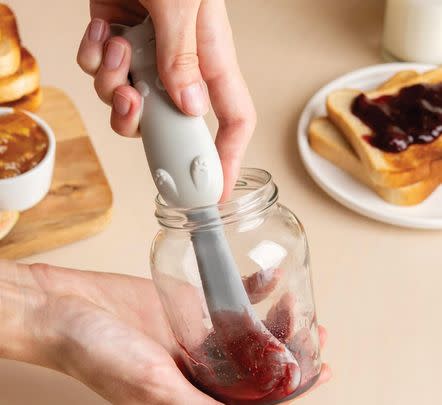 A cat-shaped jar spatula for scooping the last innards out of your jars