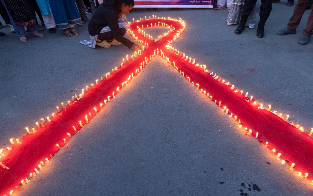 A candlelight vigil ahead of World Aids Day in Kathmandu, Nepal