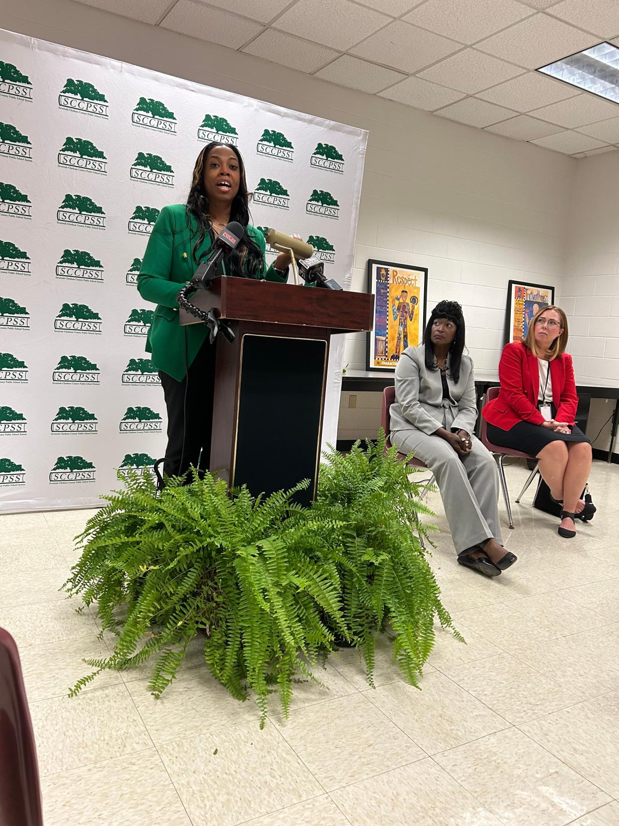 SCCPSS Director of Student Affairs, Quentina Miller-Fields (seated left) and Juvenile Court Judge Lindretta Grindle Kramer (seated right) listen as SCCPSS Superintendent, Denise Watts speaks at a press conference on Wednesday Sept. 20, 2023