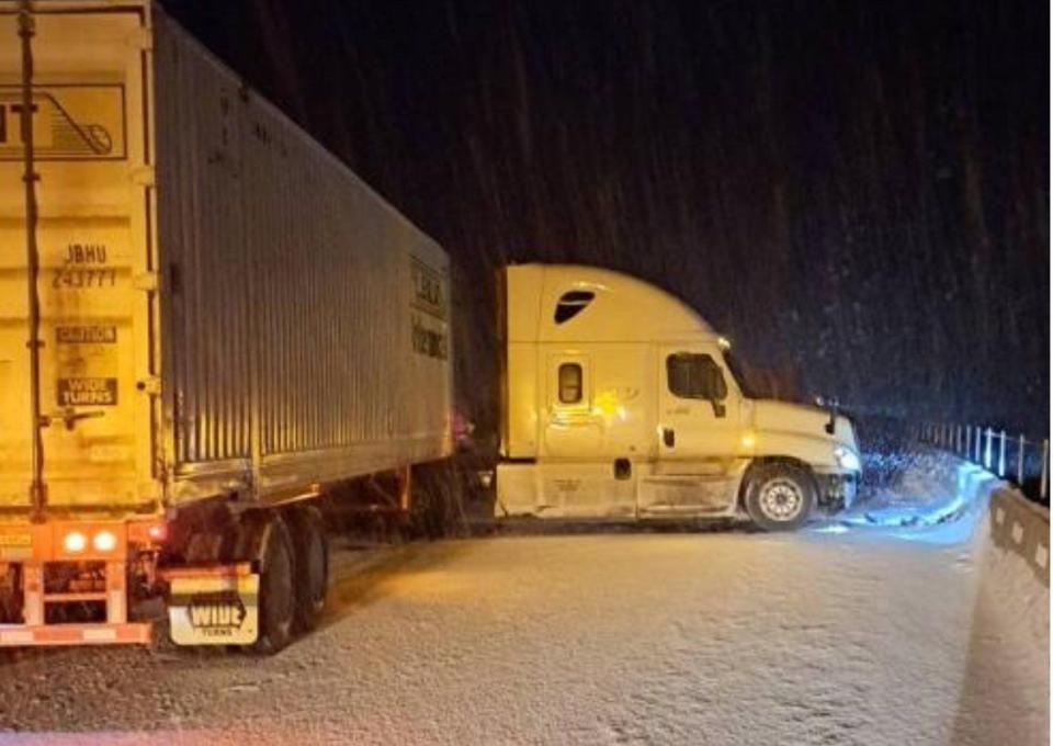 Both directions of Interstate 90 are closed after semis crashed, damaging sections of concrete barrier and pushing it from the westbound lanes into the eastbound lanes.