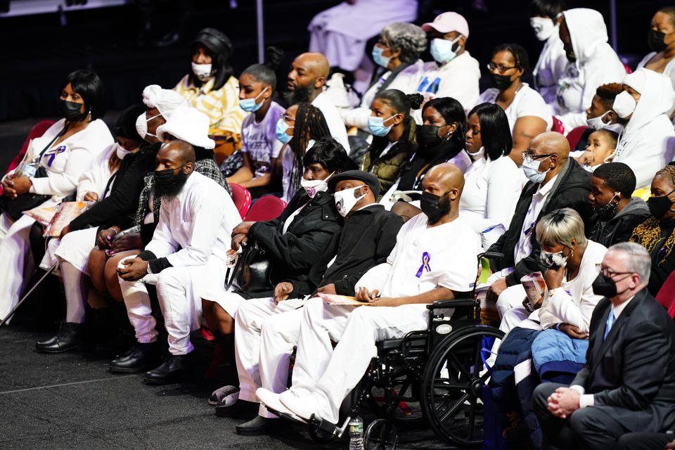 Mourners gather to pay their respects for the victims of a deadly row house fire during funeral services at Temple University in Philadelphia, Monday, Jan. 17, 2022. Officials say it was the city's deadliest single fire in at least a century. (AP Photo/Matt Rourke)