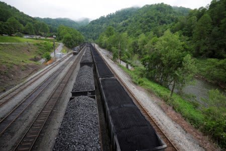 Coal sits in train cars on tracks in Grundy, Virginia, U.S., May 17, 2018.   REUTERS/Brian Snyder