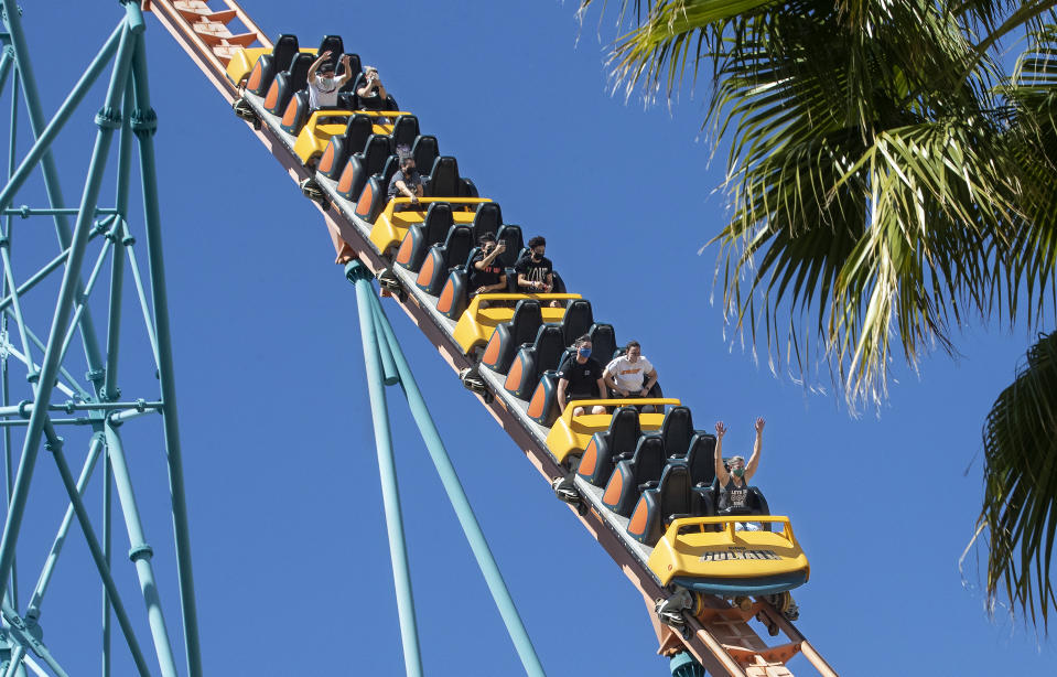 People ride the Goliath roller coaster with a 255 foot drop at Six Flags Magic Mountain in Valencia, California (Mel Melcon / Los Angeles Times via Getty Images)