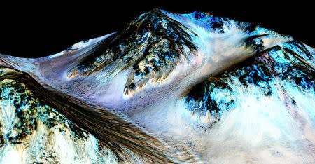 Dark, narrow, streaks on Mars inferred to have been formed by contemporary flowing water are seen in an image produced by NASA, the Jet Propulsion Laboratory (JPL) and the University of Arizona. NASA/JPL/University of Arizona