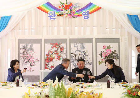South Korean President Moon Jae-in, first lady Kim Jung-sook, North Korean leader Kim Jong Un and his wife Ri Sol Ju attend a luncheon at Samjiyon Guesthouse in Ryanggang province, North Korea, September 20, 2018. Pyeongyang Press Corps/Pool via REUTERS