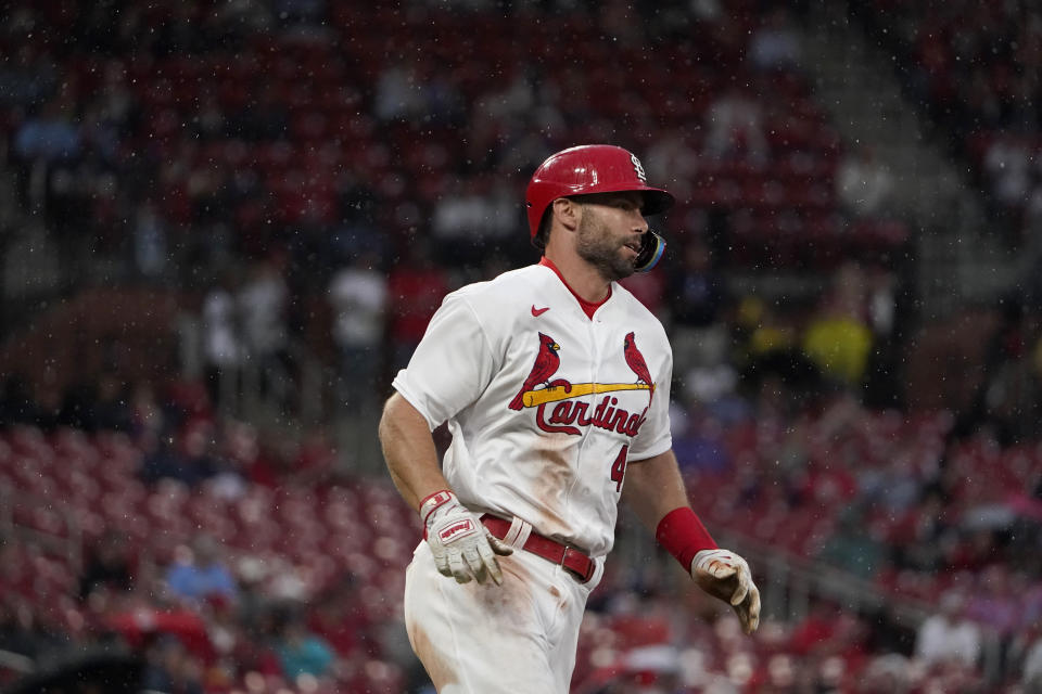 St. Louis Cardinals' Paul Goldschmidt heads for an RBI single as a steady rain falls during the second inning of a baseball game against the Arizona Diamondbacks Thursday, April 28, 2022, in St. Louis. (AP Photo/Jeff Roberson)