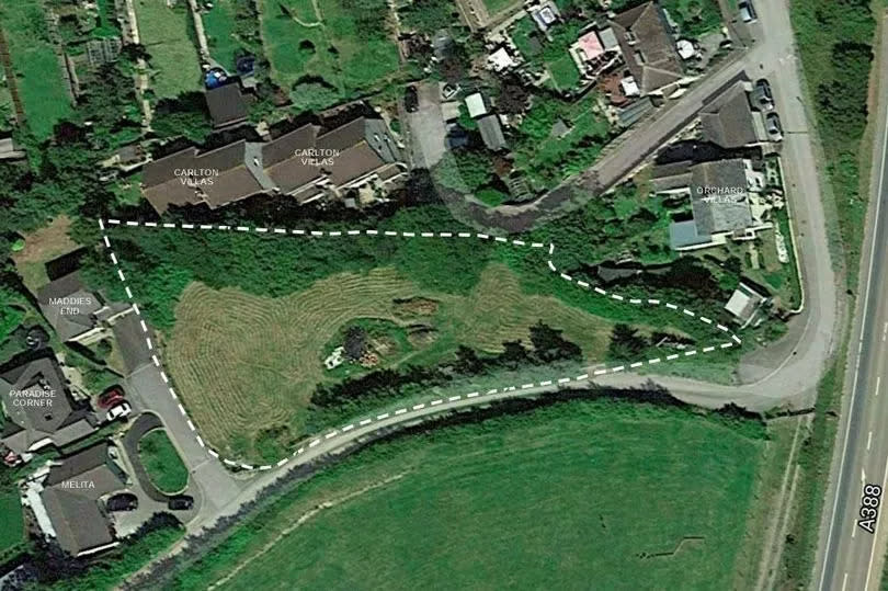 An aerial photograph showing the proposed housing development in relation to other properties